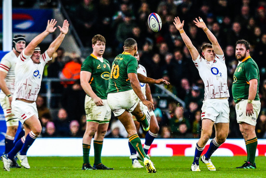 Damian Willemse lands a drop goal against England at Twickenham