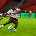 Lions scrumhalf Sanele Nohamba kicks at goalJOHANNESBURG, SOUTH AFRICA - APRIL 01: Sanele Nohamba of the Emirates Lions during the EPCR Challenge Cup, round of 16 match between Emirates Lions and Racing 92 at Emirates Airline Park on April 01, 2023 in Johannesburg, South Africa.