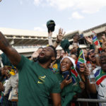 Siya Kolisi poses with fans during the team's World Cup departure ceremony