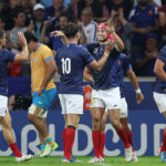 France's wing Louis Bielle-Biarrey (C) is congratulated by teammates after scoring a try during the France 2023 Rugby World Cup Pool A match between France and Uruguay at Pierre-Mauroy stadium in Lille, northern France on September 14, 2023.