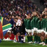 The Springboks line up for the anthem. France's players (L) and South Africa's players (R) stand for the national anthems ahead of the France 2023 Rugby World Cup quarter-final match between France and South Africa at the Stade de France in Saint-Denis, on the outskirts of Paris, on October 15, 2023.