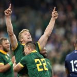 South Africa's flanker Pieter-Steph du Toit (C) and South Africa's fly-half Handre Pollard celebrate after victory during the France 2023 Rugby World Cup quarter-final match between France and South Africa at the Stade de France in Saint-Denis, on the outskirts of Paris, on October 15, 2023.