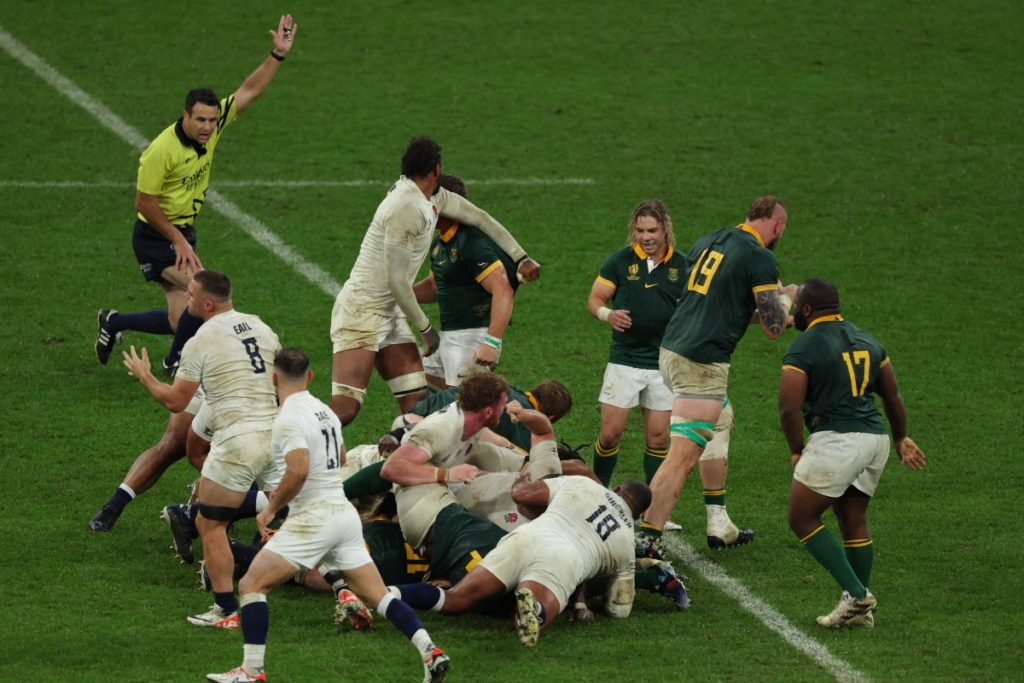 New Zealand referee Ben O'Keeffe (L) signals a penalty to South Africa during the France 2023 Rugby World Cup semi-final match between England and South Africa at the Stade de France in Saint-Denis, on the outskirts of Paris, on October 21, 2023.