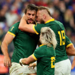 PARIS, FRANCE - OCTOBER 15: Eben Etzebeth of South Africa celebrates with RG Snyman and Faf de Klerk of South Africa after scoring his team's fourth try during the Rugby World Cup France 2023 Quarter Final match between France and South Africa at Stade de France on October 15, 2023 in Paris, France. (Photo by Chris Hyde/Getty Images)