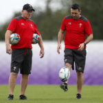 Wales' coaches Neil Jenkins (L) and Stephen Jones (R) during a training session at The Toyota Verblitz rugby football club in Toyota City on September 21, 2019. (Photo by Adrian DENNIS / AFP)