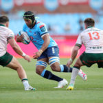 Nizaam Carr of the Vodacom Bulls challenged by Tadgh McElroy and David Hawkshaw of Connacht XV during the 2023 United Rugby Championships match between Bulls and Connacht at Loftus Stadium in Pretoria on 25 November 2023 ©Samuel Shivambu/BackpagePix