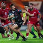 LLANELLI, WALES - NOVEMBER 11: Marius Louw of Lions races in to score try during the United Rugby Championship match between Scarlets and Emirates Lions at Parc y Scarlets on November 11, 2023 in Llanelli, Wales.