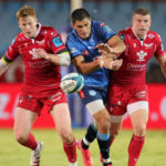 Harold Vorster of the Vodacom Bulls challenged by Rhys Patchell and Scott Williams of the Llanelli Scarlets during the United Rugby Championship 2021/22 game between the Vodacom Bulls and the Llanelli Scarlets at Loftus Versfeld Stadium, Pretoria on 18 March 2022 ©Samuel Shivambu/BackpagePix
