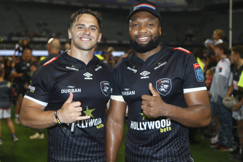 DURBAN, SOUTH AFRICA - NOVEMBER 25: Rohan Janse van Rensburg of the Hollywoodbets Sharks with Lukhanyo Am of the Hollywoodbets Sharks during the United Rugby Championship match between Hollywoodbets Sharks and Dragons at Hollywoodbets Kings Park on November 25, 2023 in Durban, South Africa. (Photo by Steve Haag Sports/Gallo Images)