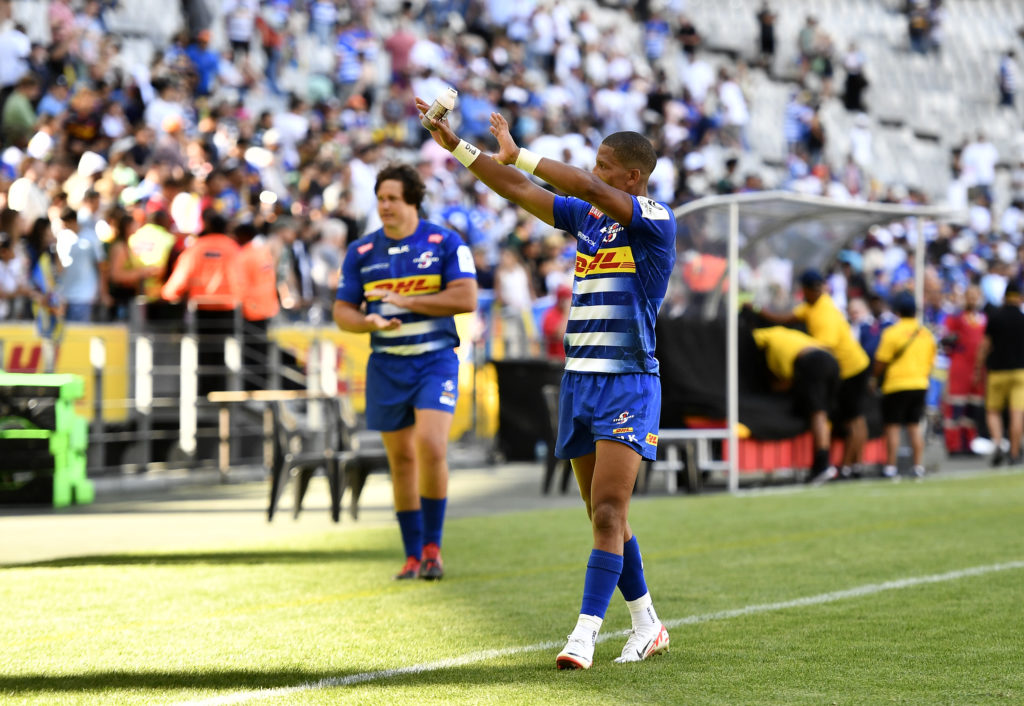 CAPE TOWN, SOUTH AFRICA - DECEMBER 16: Manie Libbok of the Stormers greets fans after the Investec Champions Cup match between DHL Stormers and La Rochelle at DHL Stadium on December 16, 2023 in Cape Town, South Africa.