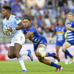 Canan Moodie of the Bulls is challenged by Suleiman Hartzenberg of the Stormers during the 2023 United Rugby Championship game between the Stormers and Bulls at Cape Town Stadium on 23 December 2023 ©Ryan Wilkisky/BackpagePix