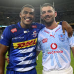 Springbok teammates Damian Willemse of the Stormers and Willie le Roux of the Bulls embrace after the 2023 United Rugby Championship game between the Stormers and Bulls at Cape Town Stadium on 23 December 2023 ©Ryan Wilkisky/BackpagePix