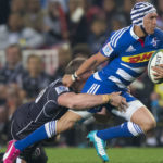 CAPE TOWN, SOUTH AFRICA - JULY 12: Gio Aplon of the Stormers tackled by Jean Deysel of the Sharks during the Super Rugby match between DHL Stormers and Cell C Sharks at DHL Newlands Stadium on July 12, 2014 in Cape Town, South Africa. (Photo by Manus van Dyk/Gallo Images)