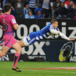 CAPE TOWN, SOUTH AFRICA - JULY 13: Bryan Habana of the Stormers dives over for a try as Morné Steyn of the Blue Bulls can only watch during the Super Rugby match between DHL Stormers and Vodacom Bulls at DHL Newlands Stadium on July 13, 2013 in Cape Town, South Africa. (Photo by Peter Heeger/Gallo Images)