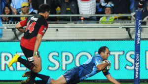 SOWETO, SOUTH AFRICA - MAY 22: Sean Maitland looks on as Fourie du Preez scores during the Super 14 semi-final match between Vodacom Bulls and Crusaders at Orlando Stadium on May 22, 2010 in Soweto, South Africa. (Photo by Lee Warren / Gallo Images / Getty Images)