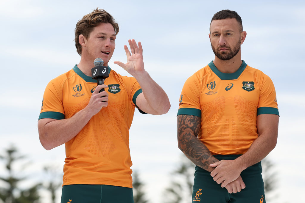 SYDNEY, AUSTRALIA - JUNE 22: (L-R) Michael Hooper and Quade Cooper speak during a Rugby Australia media opportunity launching the Wallabies 2023 Rugby World Cup jersey, at Coogee Oval on June 22, 2023 in Sydney, Australia. (Photo by Cameron Spencer/Getty Images)