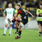 WELLINGTON, NEW ZEALAND - JUNE 15: Damian McKenzie of the Chiefs kicks during the Super Rugby Pacific Semi Final match between Hurricanes and Chiefs at Sky Stadium, on June 15, 2024, in Wellington, New Zealand. (Photo by Hagen Hopkins/Getty Images)