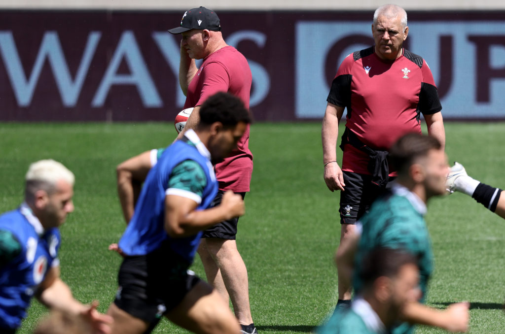 LONDON, ENGLAND - JUNE 21: Warren Gatland, Head Coach of Wales, looks on as players of Wales warm up during the Wales Captain's Run at Twickenham Stadium on June 21, 2024 in London, England. (Photo by Warren Little/Getty Images)