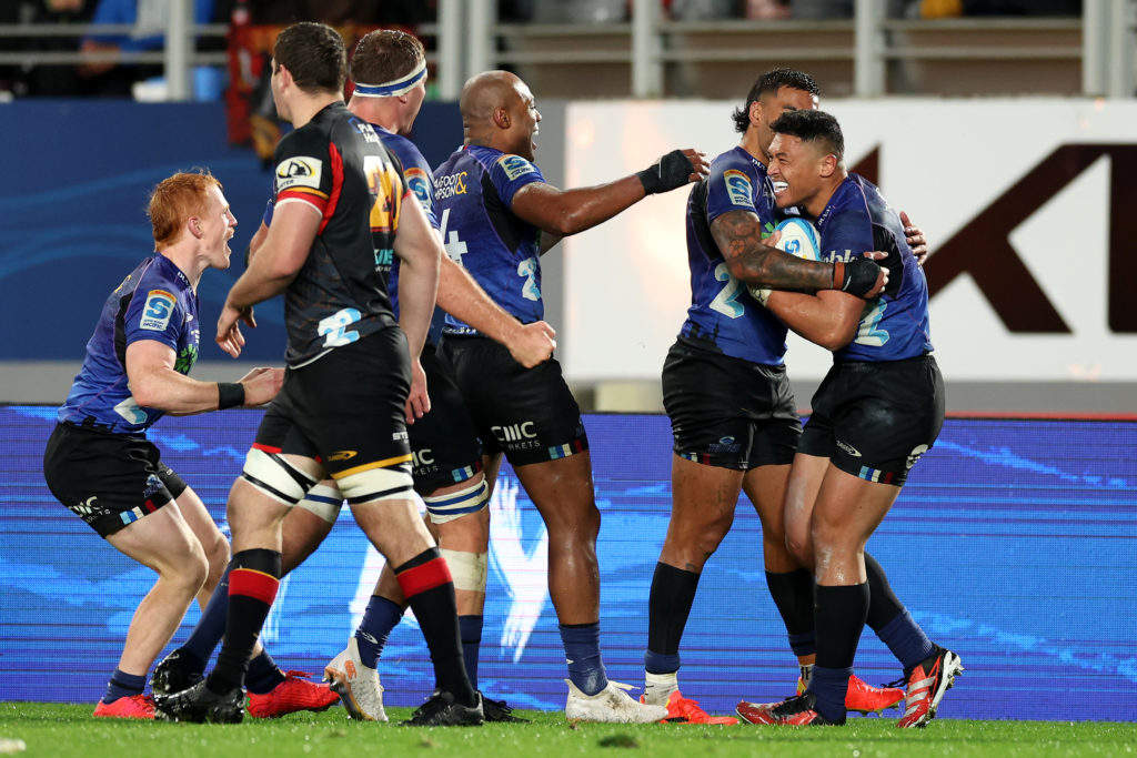 AUCKLAND, NEW ZEALAND - JUNE 22: Caleb Clarke of the Blues celebrates with his team after scoring a try during the Super Rugby Pacific Grand Final match between Blues and Chiefs at Eden Park, on June 22, 2024, in Auckland, New Zealand. (Photo by Phil Walter/Getty Images)