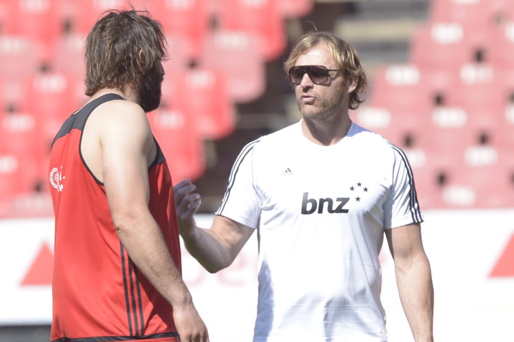 JOHANNESBURG, SOUTH AFRICA - AUGUST 04: Captain Sam Whitelock of the Crusaders and Coach Scott Robertson of the Crusaders during the BNZ Crusaders stadium walk-over and kicking practice at Emirates Airline Park on August 04, 2017 in Johannesburg, South Africa. (Photo by Sydney Seshibedi/Gallo Images)