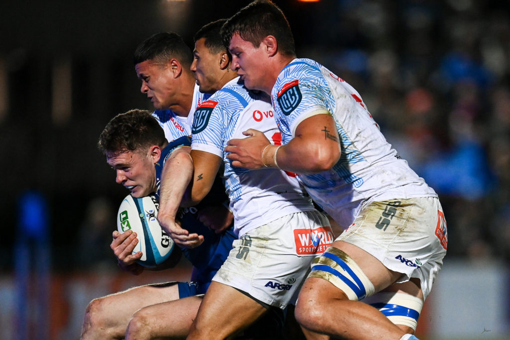 DUBLIN, IRELAND - MARCH 29: Rob Russell of Leinster is tackled by Devon Williams, Embrose Papier and Elrigh Louw of Vodacom Bulls during the United Rugby Championship match between Leinster and Vodacom Bulls at RDS Arena on March 29, 2024 in Dublin, Ireland. (Photo by Harry Murphy/Gallo Images)