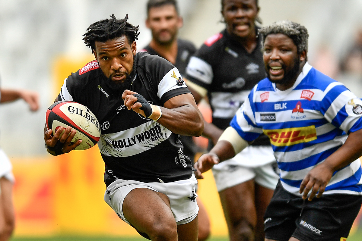 CAPE TOWN, SOUTH AFRICA - AUGUST 24: Jurenzo Julius of the Sharks scores a try during the Carling Currie Cup, Premier Division match between DHL Western Province and Hollywoodbets Sharks at DHL Stadium on August 24, 2024 in Cape Town, South Africa. (Photo by Ashley Vlotman/Gallo Images)